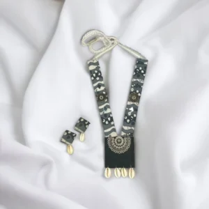 Grey Necklace with Cowrie