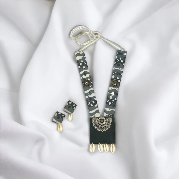 Grey Necklace with Cowrie