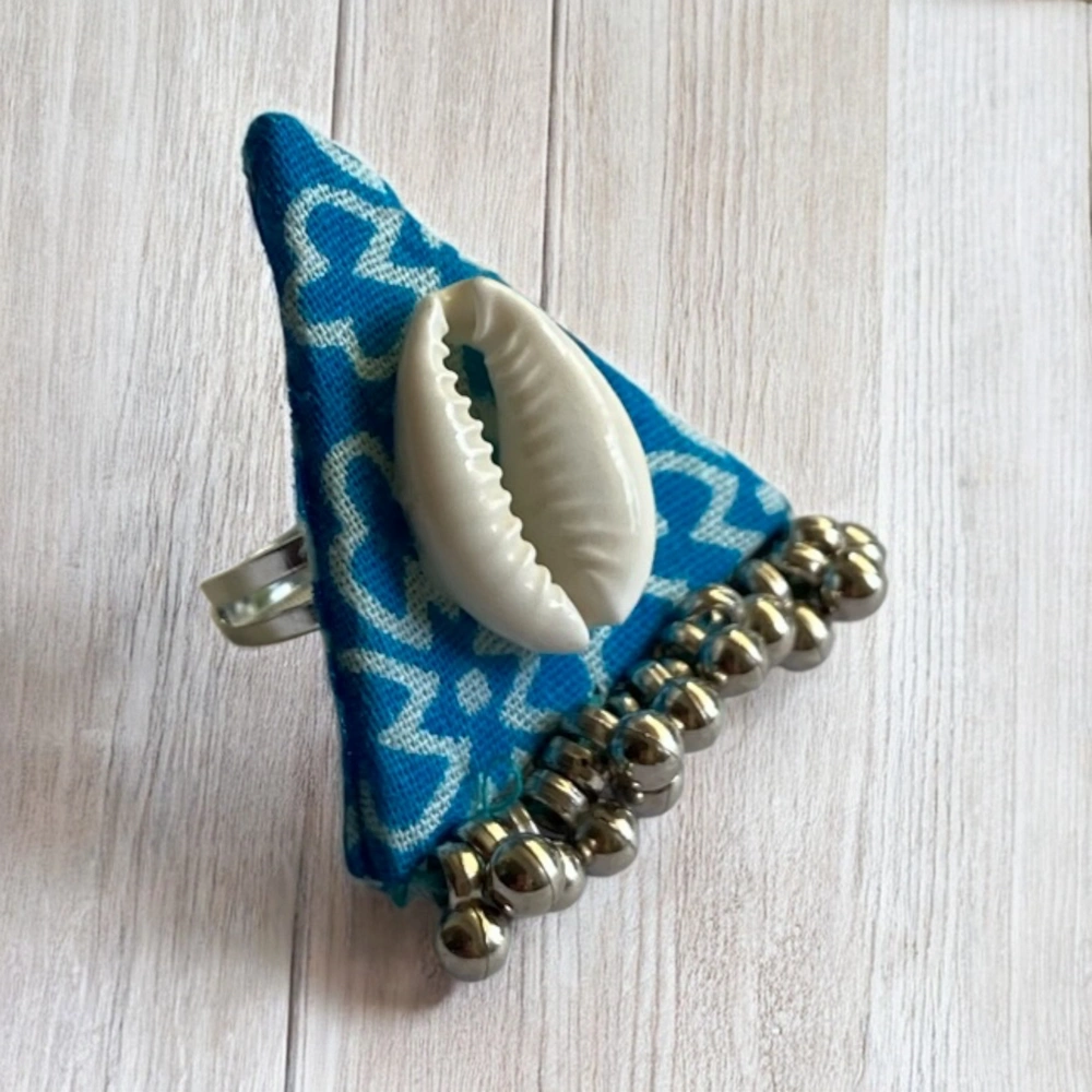 Sky blue triangle ring